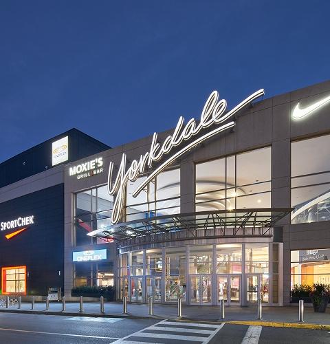 Yorkdale mall exterior at night showing Moxie's, SportChek, Cineplex, and Nike signs
