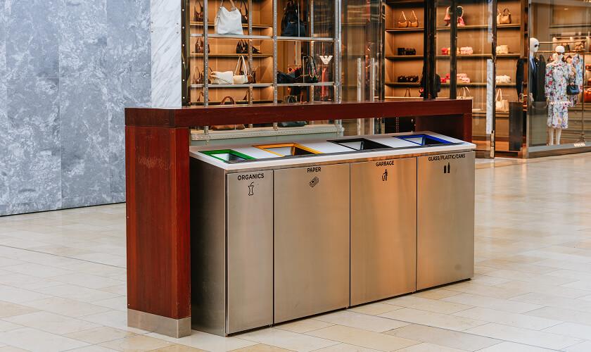 Four-compartment recycling station for organics, paper, garbage, and glass in mall
