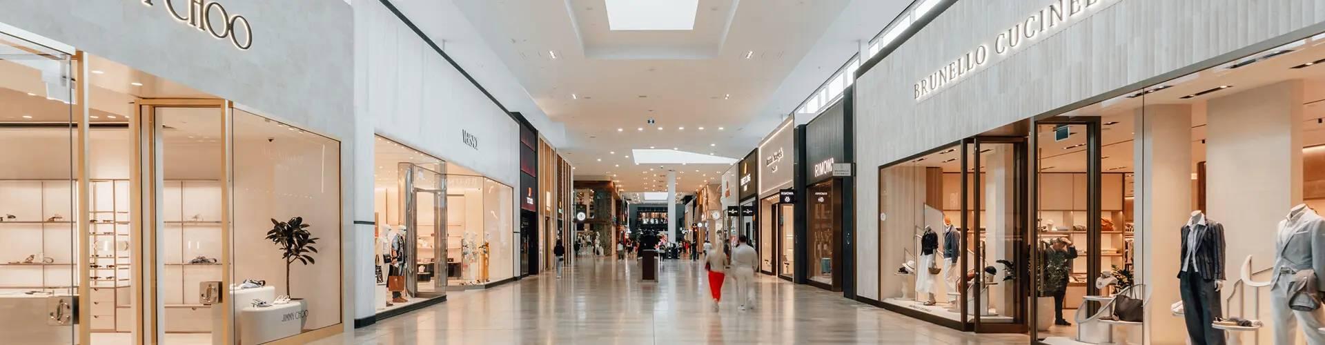 Yorkdale mall corridor with Jimmy Choo, 1850, and Brunello Cucinelli storefronts