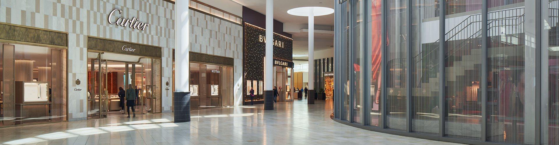 Yorkdale mall corridor with Cartier and Bvlgari luxury storefronts
