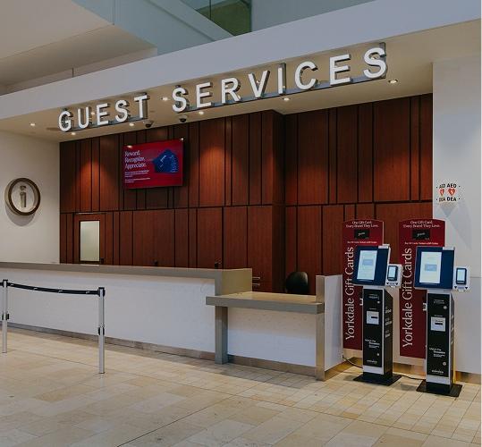 Yorkdale Shopping Centre Guest Services desk with gift card kiosks, information counter & customer assistance area