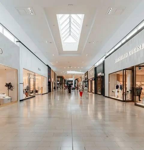 Yorkdale mall corridor with Jimmy Choo, 1850, and Brunello Cucinelli storefronts