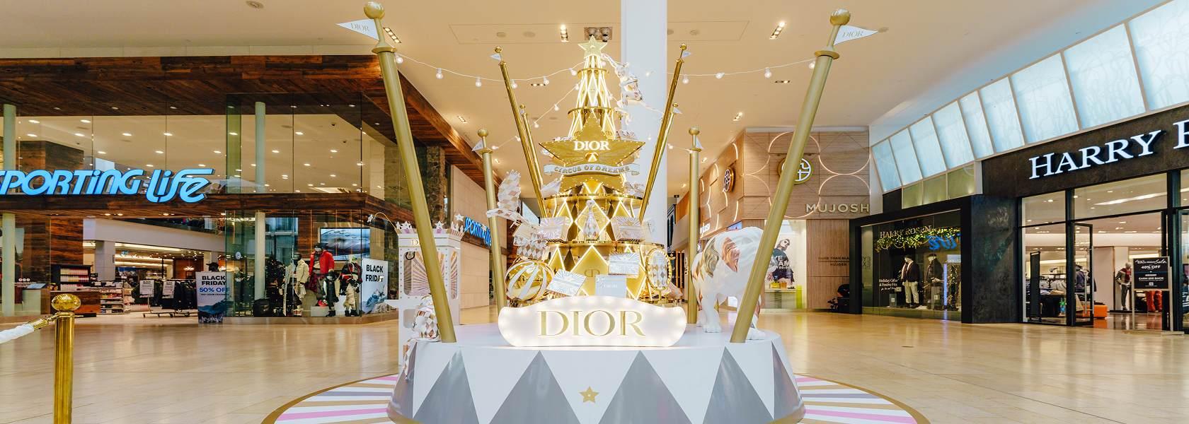 Dior Circus of Dreams gold holiday installation displayed in Yorkdale mall
