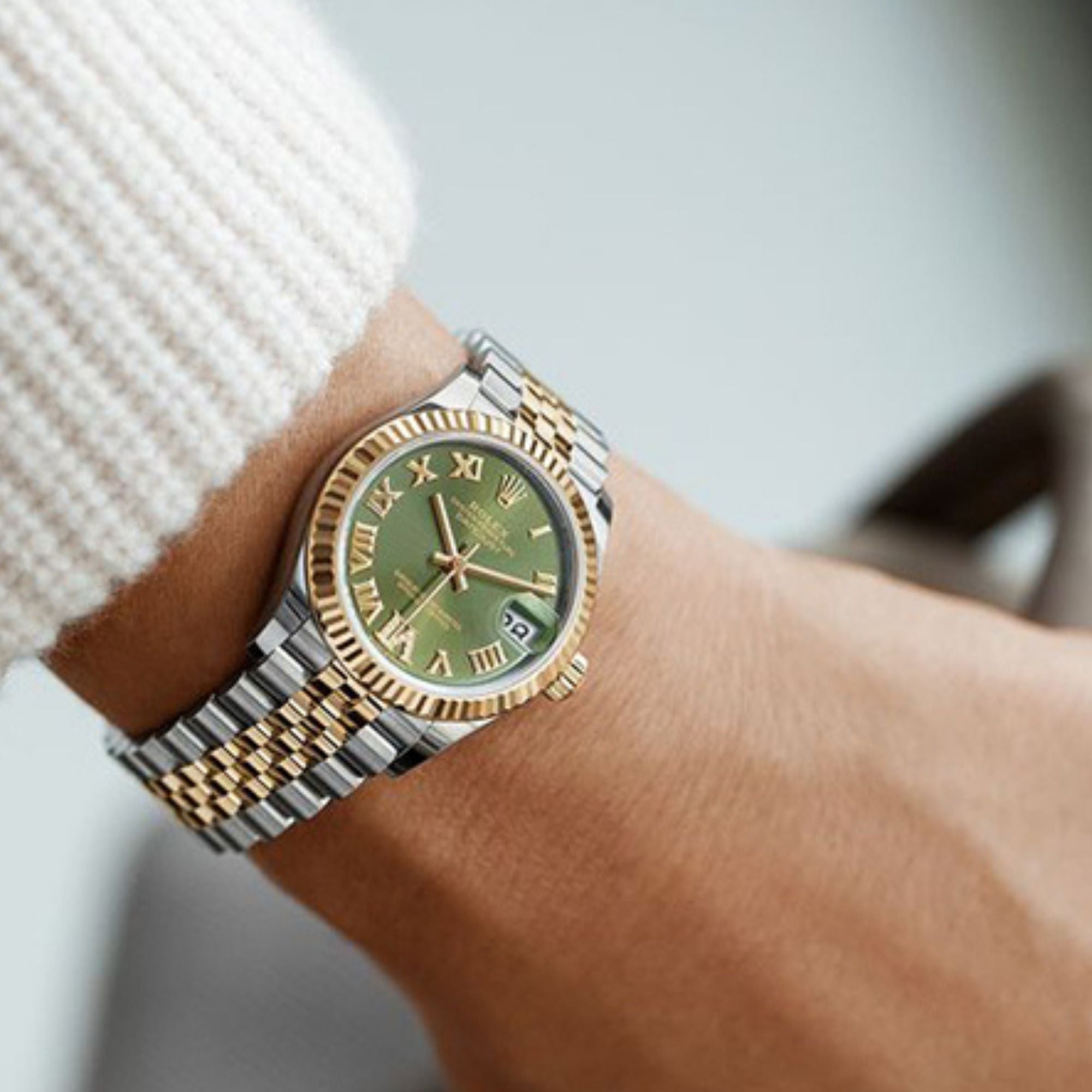 Rolex watch with light green face