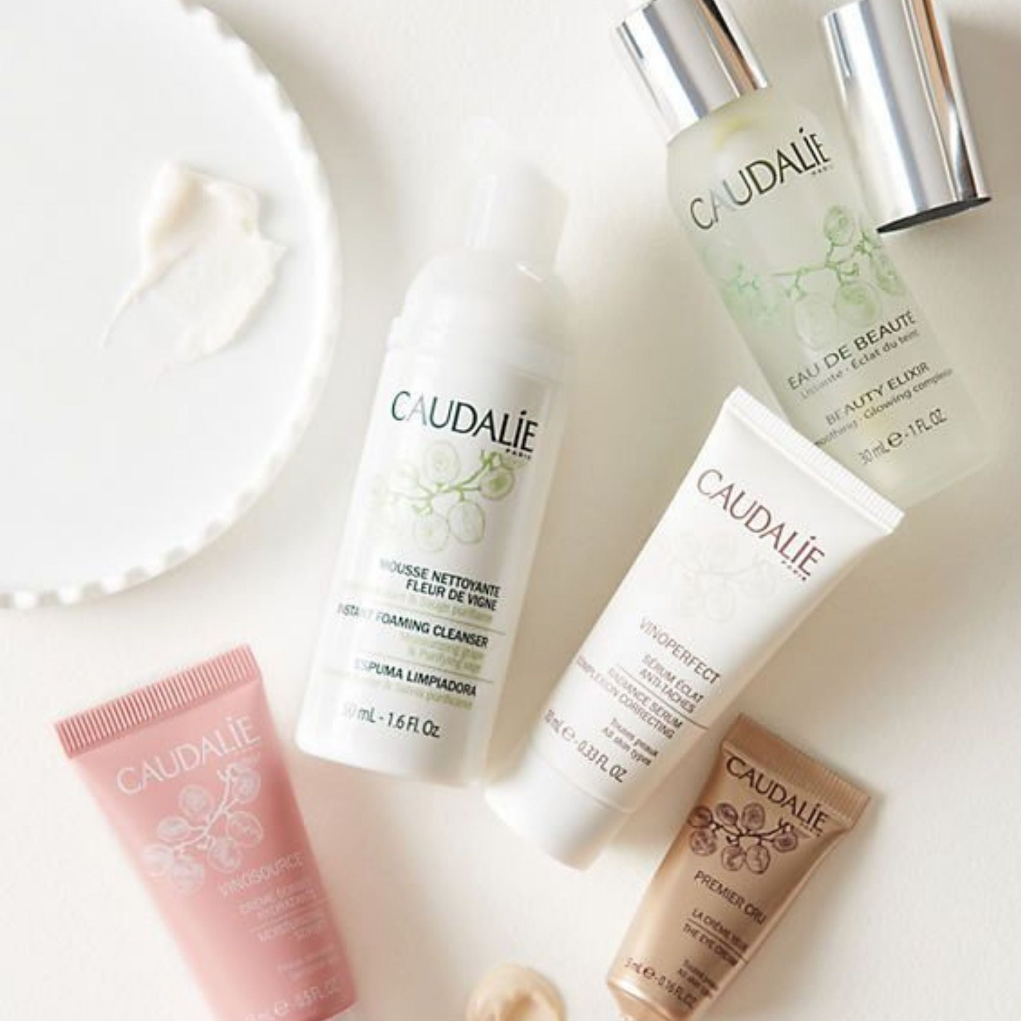 Caudalie skincare products flatlay