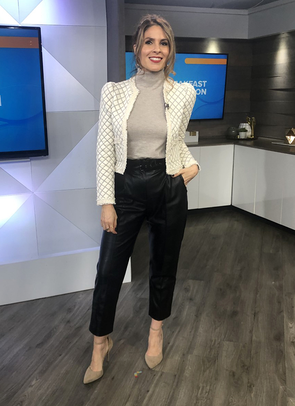 Dina wearing white blazer with beige turtle neck paired with black trousers - 2