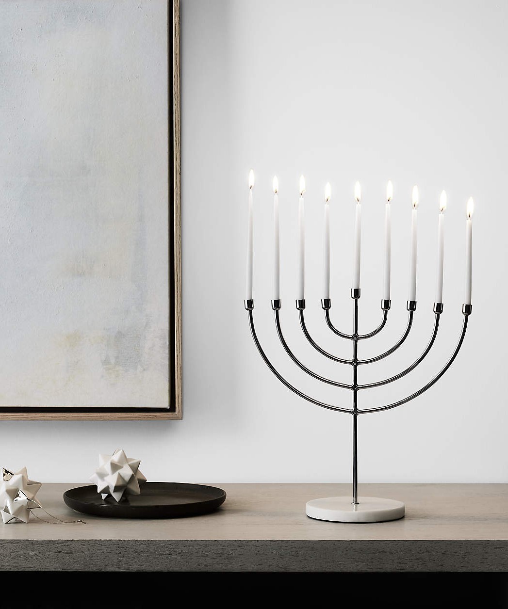 Image of a menorah on top of a table.