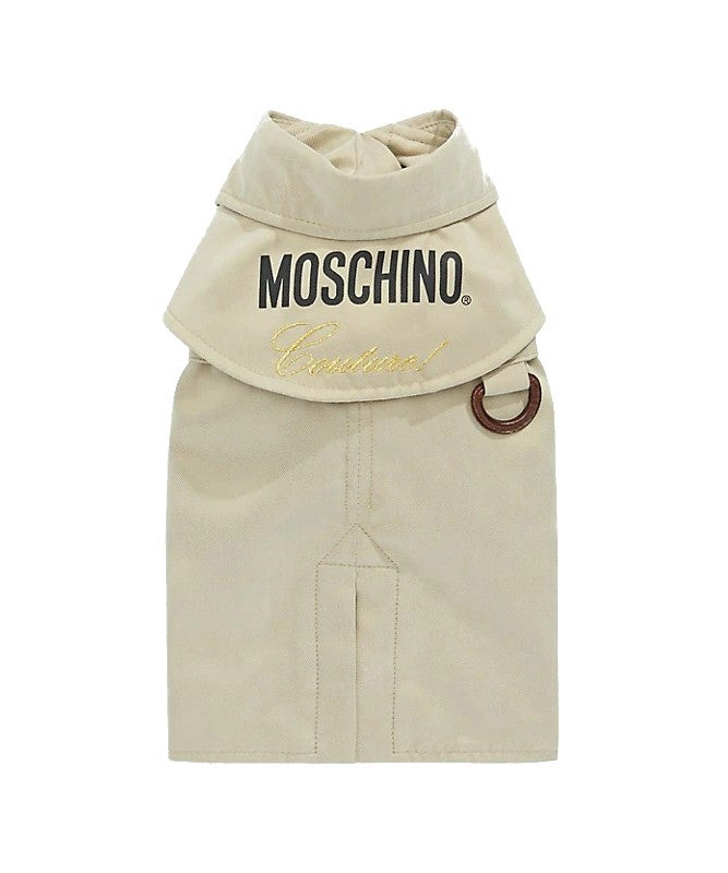 Moschino dog trench coat in beige. The words "Moschino couture!" are written on the back.