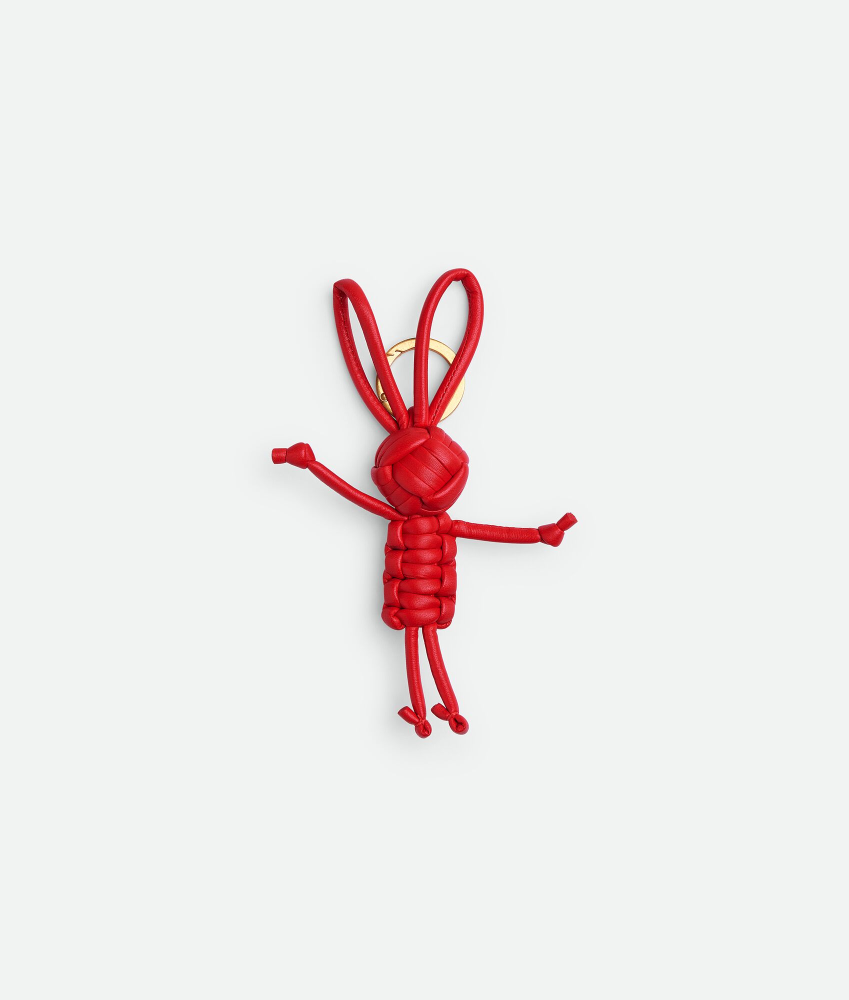 Image of a Bottega Veneta Lunar New Year bunny charm in red.