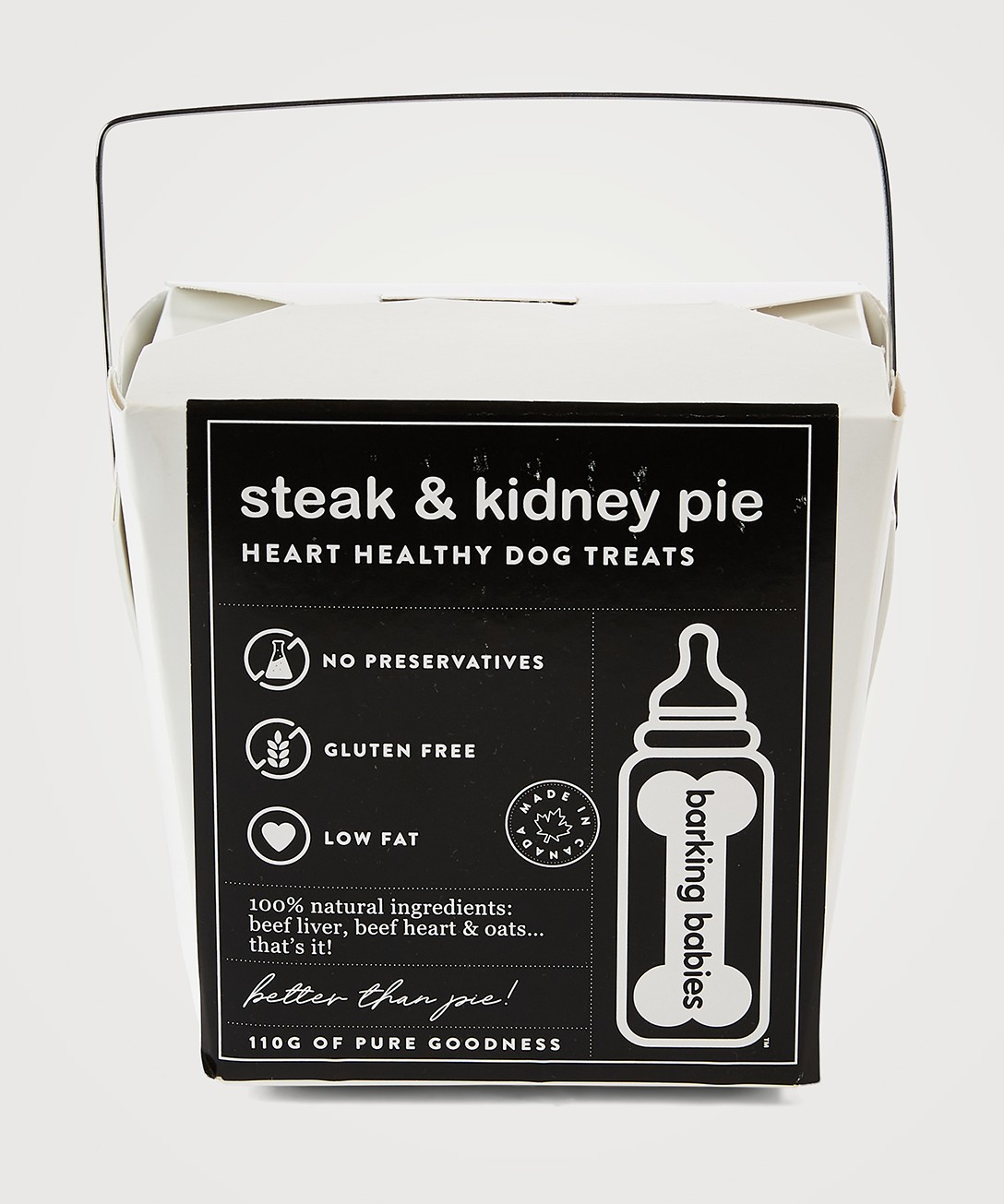 Image of a Chinese takeout-style box with a label that says "steak and kidney pie heart healthy dog treats."
