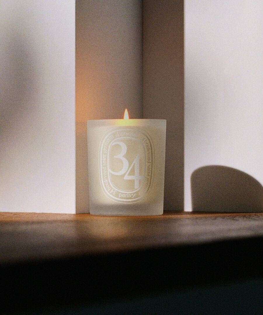 Diptyque candle burning