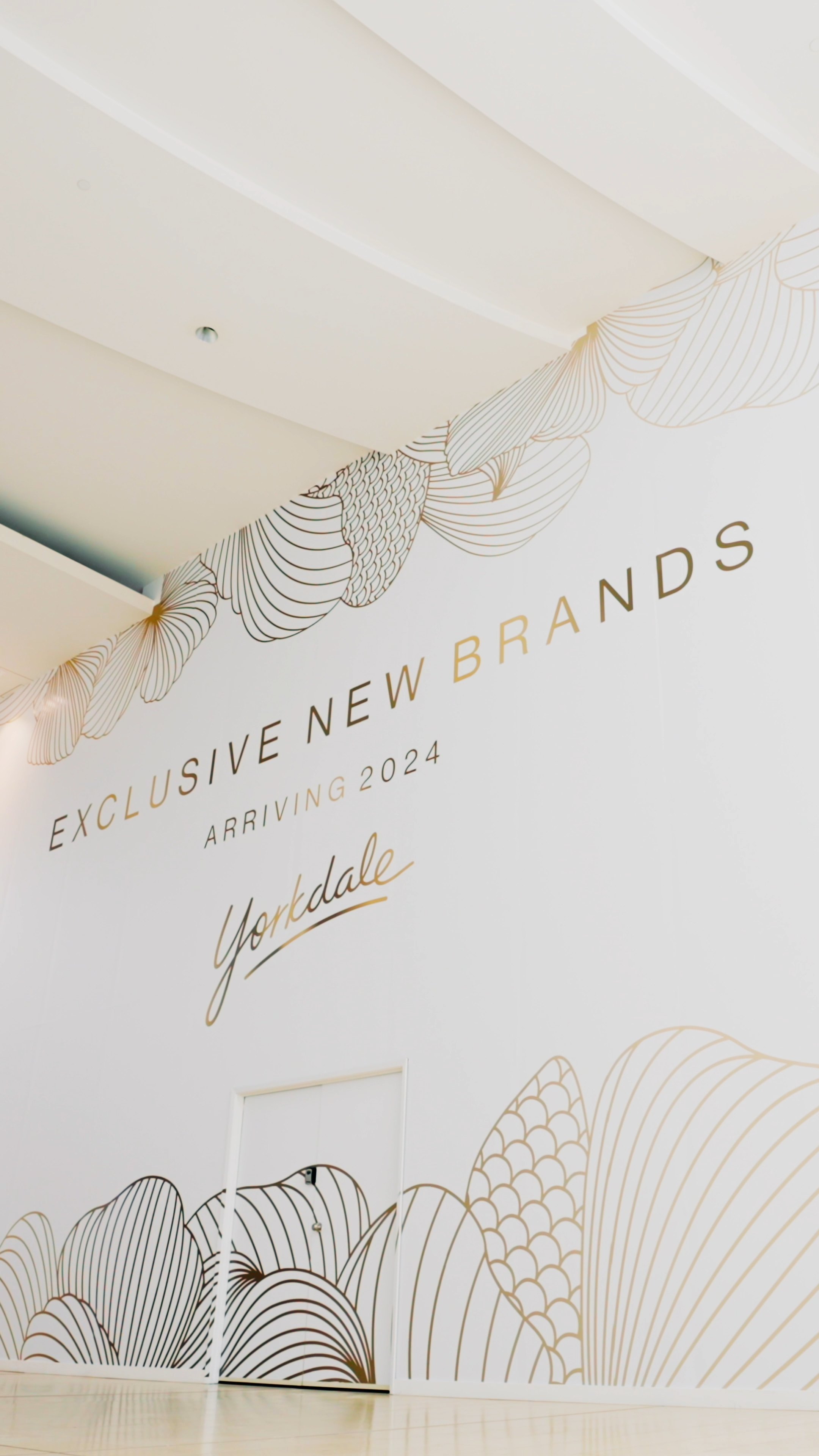 Hoarding of exclusive new brands arriving at Yorkdale in 2024.