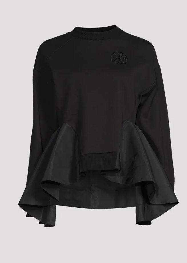 Long sleeve blouse with a flaring bottom from Alexander McQueen.