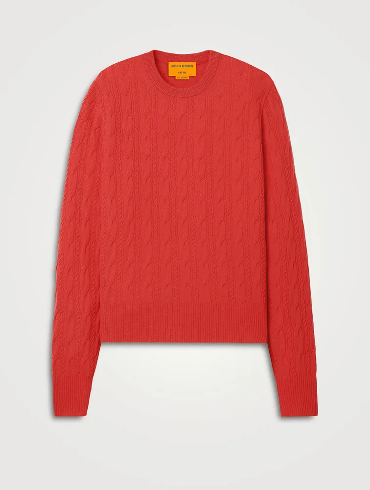 guest in residence red sweater