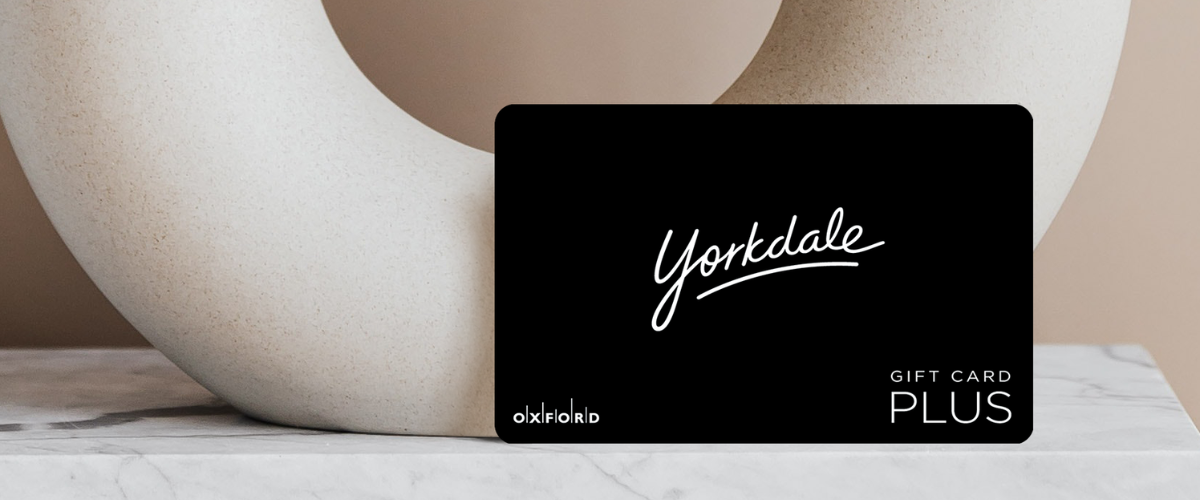 Yorkdale Black Gift Card with Oxford Gift Card Plus on the front and neutral valse background.