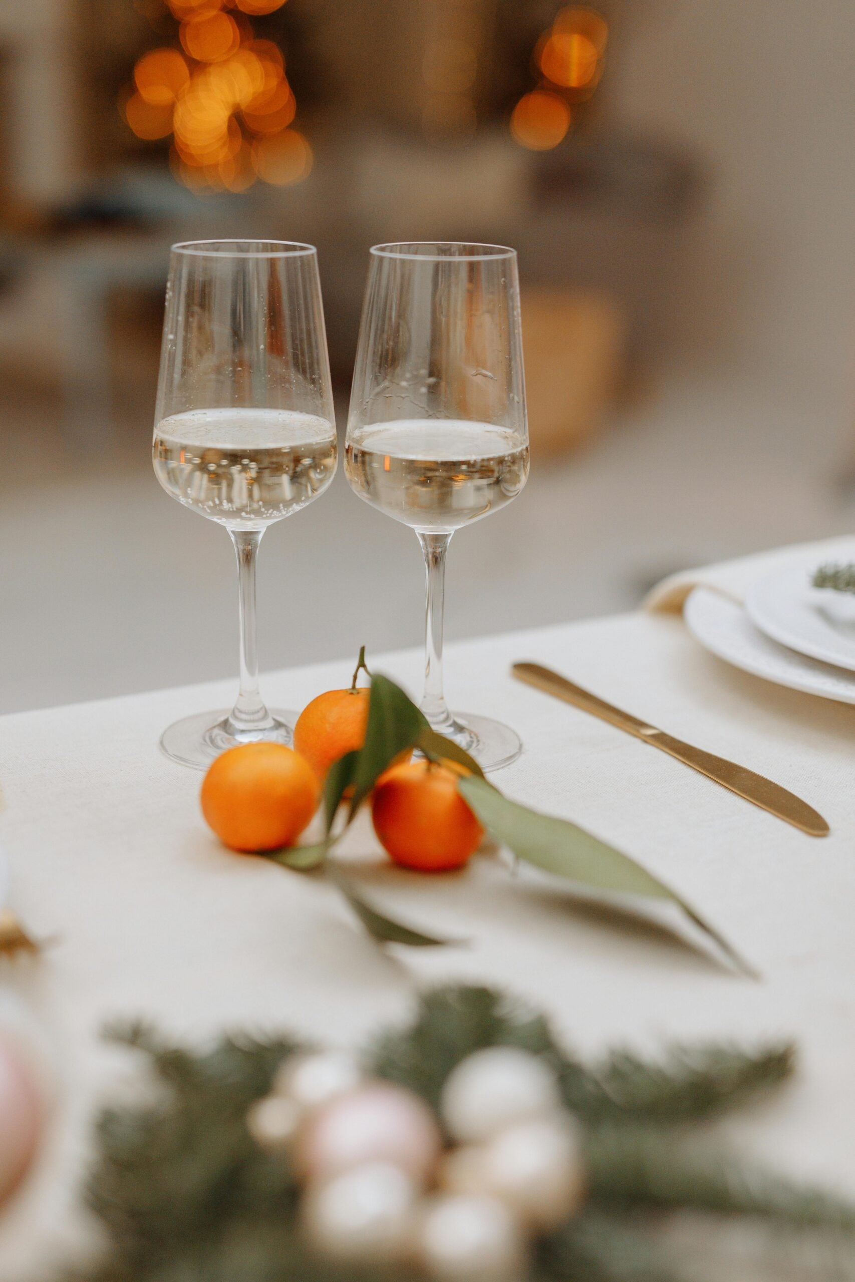 Two wine glasses on table