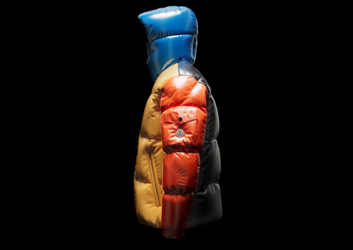 Side profile of a Moncler puffer jacket in metallic blue, orange, and yellow colors, promoting the Made-to-Order event; Yorkdale Shopping Centre